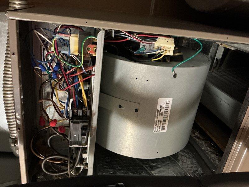 Completed cooling maintenance tune-up on 7-year-old York HVAC system. Performed comprehensive inspection of evaporator coil assembly, blower motor housing, and electrical connections; noted dust and debris accumulation on heat exchanger fins and casing. System tested and confirmed operational with all components functioning properly.
