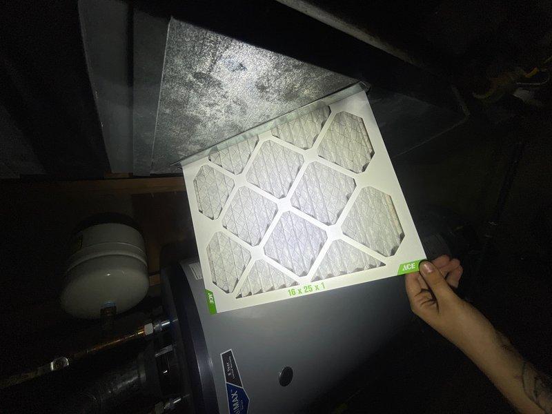 Completed comprehensive tune-up service on single R-410A air conditioning unit located at ground level in rear of property. Inspected and documented equipment specifications, verified proper refrigerant type labeling, and checked existing 16x25x1 pleated air filter for condition and proper fitment within the system.