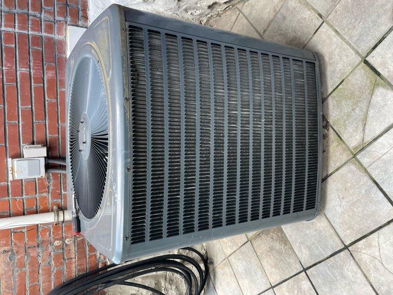 Performed preventative maintenance tune-up on two residential air conditioning systems at a single-family home. Serviced one York brand outdoor condensing unit and one additional dark gray condenser unit, both located on exterior pads. Completed comprehensive inspection of both systems including visual assessment of condenser coils, fan operation, refrigerant line connections, and electrical disconnect components. All units found to be in functional operating condition with normal outdoor weathering present.