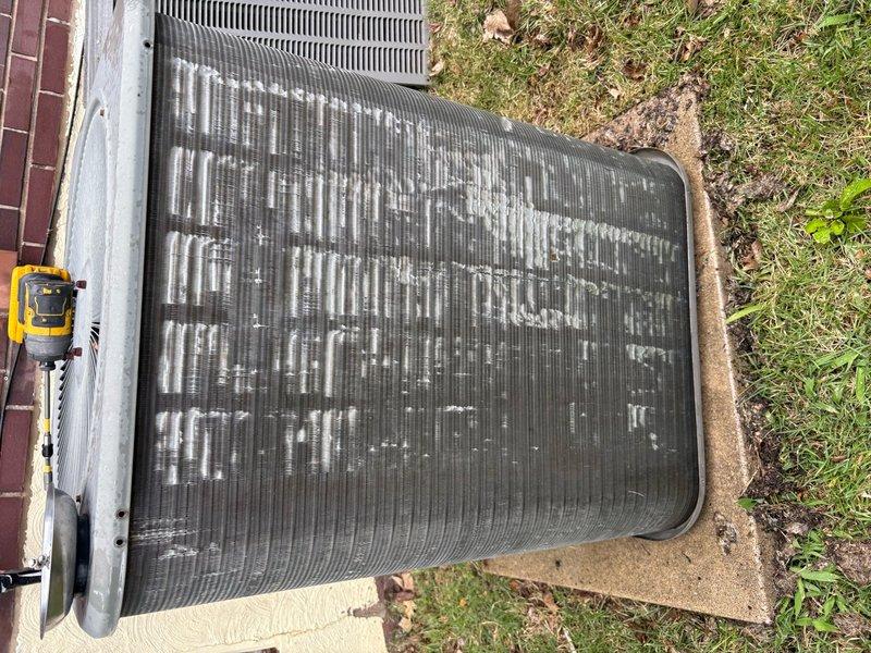 Completed comprehensive cooling system tune-up on single outdoor condensing unit. Performed standard maintenance protocol including inspection of condenser coil which showed moderate mineral deposits and debris accumulation on fins, checked refrigerant lines, verified electrical connections, and tested system operation. Unit operational and running within normal parameters upon completion.