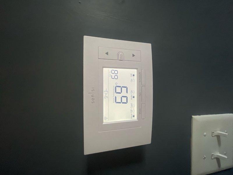 Responded to complaint of excessive noise and vibration from newly installed outdoor unit located in stairwell. Upon arrival, inspected 1-month-old air conditioning system and performed diagnostic assessment. Examined control board connections and verified all electrical components were properly secured and functioning within normal parameters. Checked thermostat operation and confirmed system was maintaining set point of 68°F. Identified and addressed vibration issue by inspecting mounting hardware and unit placement. System tested and verified to be operating under first-year warranty coverage.