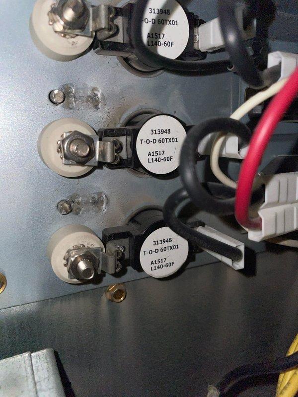Replaced faulty high limit switch and timer assembly on air handler heating system. Removed old components from electrical control panel, installed new fuses and timer with proper wire connections to terminal blocks, and verified all electrical connections were secure. System tested and restored to normal heating operation.