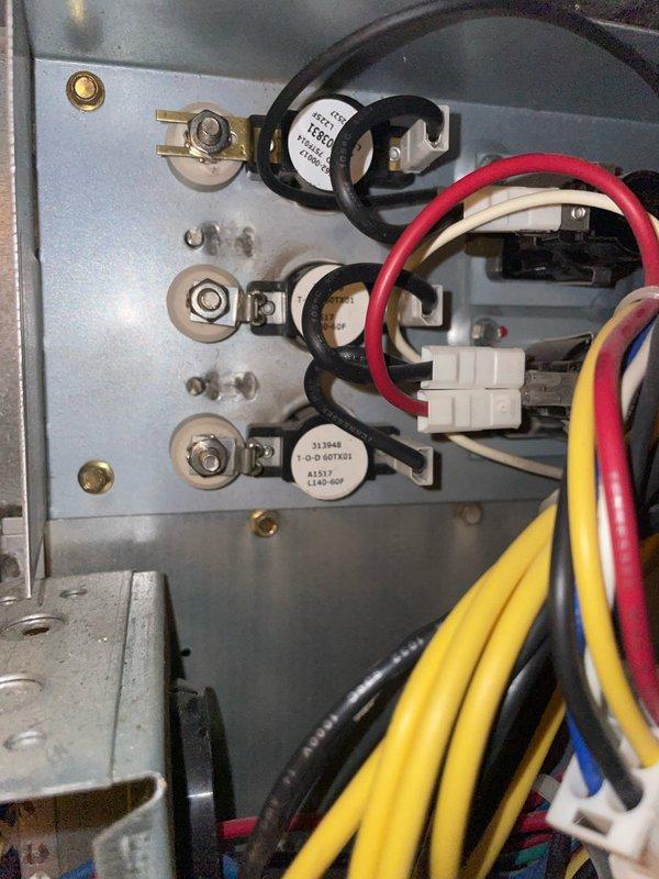 Replaced faulty high limit switch and timer assembly on air handler heating system. Removed old components from electrical control panel, installed new fuses and timer with proper wire connections to terminal blocks, and verified all electrical connections were secure. System tested and restored to normal heating operation.