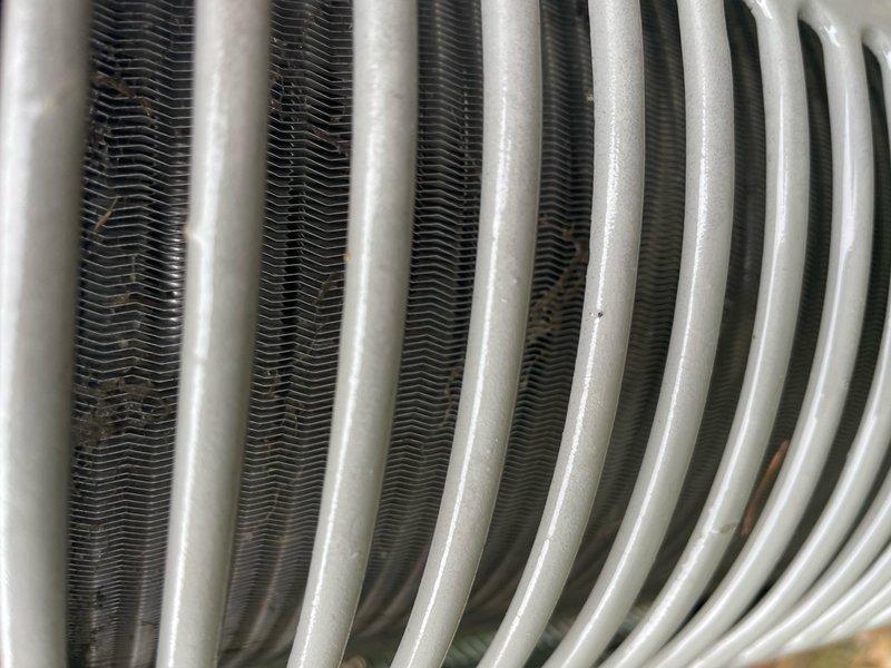 Completed routine cooling maintenance and tune-up on residential air conditioning system. Performed comprehensive inspection of outdoor condenser unit, verified proper operation of fan motor and compressor, cleaned condenser coils to ensure optimal heat transfer efficiency, and confirmed system is functioning within normal parameters. All components tested and operational with no deficiencies noted.