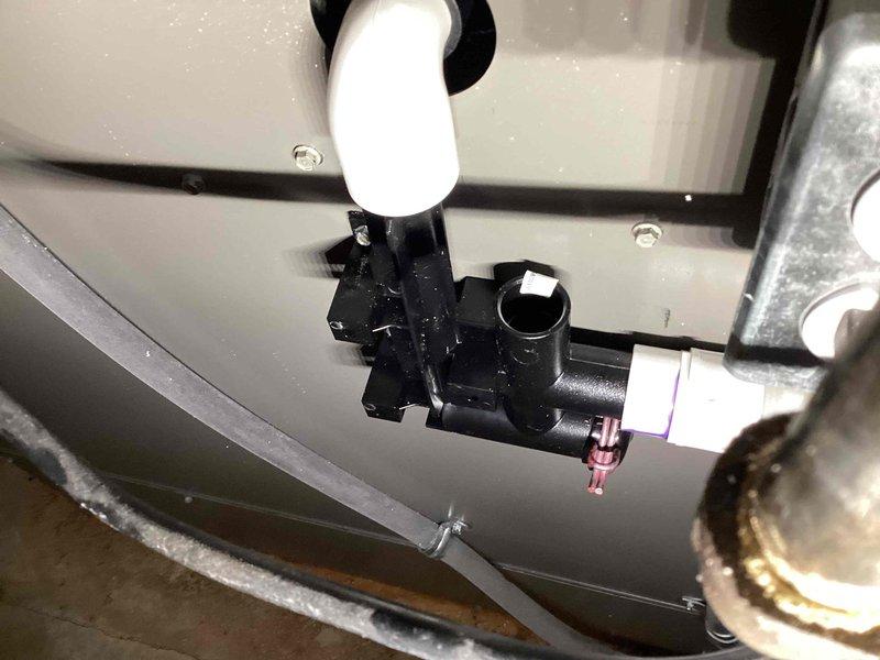 Completed warranty replacement of collector box assembly on Lennox HVAC system. Removed defective condensate collection component and installed new unit, ensuring proper drainage connections and secure mounting to equipment base. System tested and verified operational with heating and cooling functions confirmed working properly.