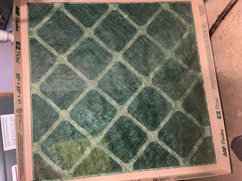 Completed comprehensive cooling system tune-up on 12-year-old air conditioning unit. Performed standard maintenance procedures including inspection of outdoor condenser unit, verification of proper airflow through top grille assembly, and replacement of heavily soiled 20x20 air filter that showed significant dust and debris accumulation. System operating within normal parameters upon completion of service.