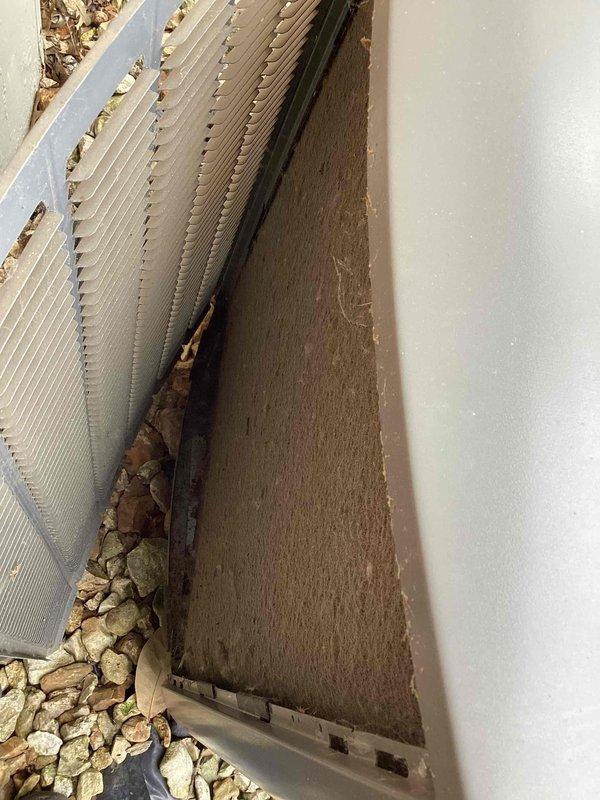 Completed comprehensive tune-up service on a 2-year-old residential air conditioning system. Upon arrival, found significant leaf debris and organic matter accumulated around the condenser unit base and along exterior panels. Cleared all debris from around unit perimeter and base to ensure proper airflow and prevent potential obstruction of heat exchange components. Performed standard preventive maintenance inspection of condenser unit, checking refrigerant levels, electrical connections, and overall system operation. Unit tested and operating within normal parameters upon completion.