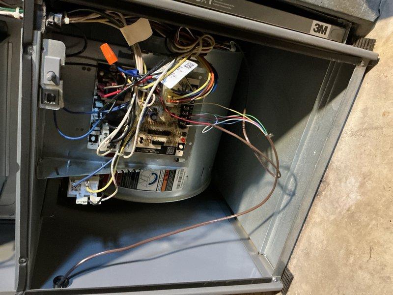 Completed comprehensive cooling maintenance tune-up on HVAC system. Inspected internal components including control board, electrical connections, and wiring harness, confirming all connections secure and properly routed. Verified air return grille installation and airflow functionality. System tested and operating within normal parameters upon completion.
