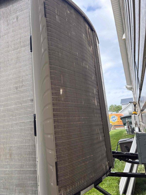 Completed comprehensive AC tune-up on single outdoor condenser unit as scheduled. Performed standard maintenance procedures including inspection of condenser coils which showed accumulation of dust, debris, and pollen on aluminum fins, system diagnostics, and documentation with photos. Unit is operational and accessible on exterior concrete pad.
