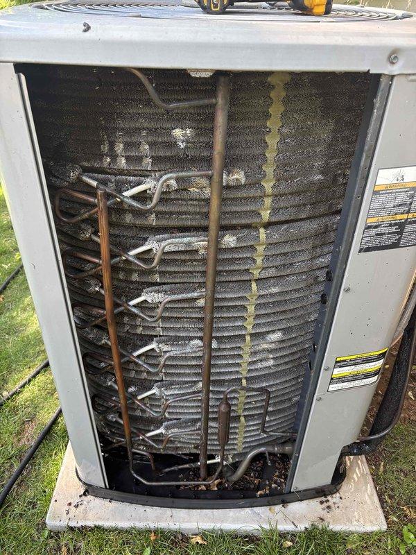 Completed comprehensive air conditioning tune-up on single outdoor unit as part of scheduled maintenance program. Performed standard preventative maintenance procedures including inspection of condenser coils, which showed moderate dirt accumulation and environmental staining, and examination of refrigerant lines and connections. Replaced heavily soiled air filter that exhibited significant dust and debris buildup throughout the mesh structure, particularly in the upper sections, which was restricting proper airflow to the system.