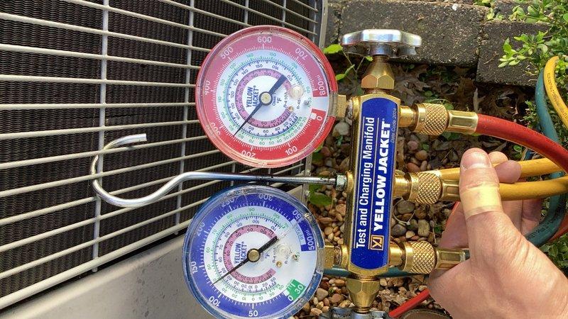 Performed comprehensive cooling maintenance on a 9-year-old air conditioning system. Conducted AC tune-up including refrigerant pressure testing using manifold gauge set to verify proper system charge and operating pressures. Inspected outdoor condenser unit, confirming proper operation of fan assembly and clean condenser coil fins. System tested and operating within normal parameters with no deficiencies noted.