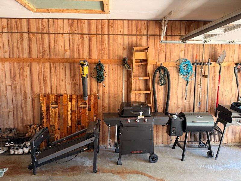Responded to service call for electric vehicle charging station estimate. Assessed existing electrical service panel and meter configuration mounted on exterior wall, evaluated garage interior space for potential charger installation location, and documented current electrical infrastructure. Provided customer with comprehensive quote for EV charger installation based on site conditions and electrical capacity requirements.
