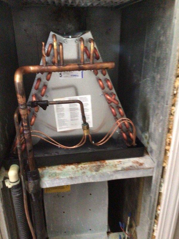 Replaced failed evaporator coil in air handler system. Removed old coil, installed new unit, reconnected refrigerant lines, and verified proper system operation. Old component was disposed of per standard procedures.