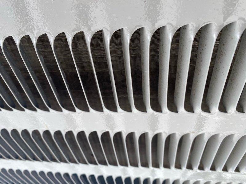 Completed cooling maintenance tune-up on 3-year-old Rheem air conditioning system. During inspection, discovered heavy frost and ice buildup on evaporator coil fins, indicating restricted airflow or potential refrigerant issue. Cleaned condenser coils, checked refrigerant levels, inspected electrical connections, and verified proper system operation. System restored to normal working condition with improved heat transfer efficiency across coil surfaces.