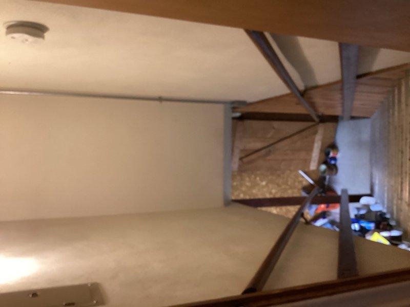Completed cooling system maintenance tune-up in attic-accessed HVAC unit. Performed standard preventive maintenance procedures including inspection of all components, cleaning, and system testing. System confirmed operational and functioning properly upon completion.