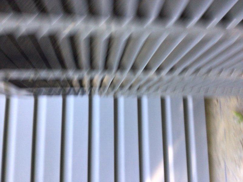 Performed preventive maintenance on 7-year-old Trane PSCC cooling system. Inspected and confirmed clean air filter with proper airflow, examined evaporator coil fins showing good condition with no significant debris buildup. All components operating within normal parameters with no deficiencies noted during inspection.