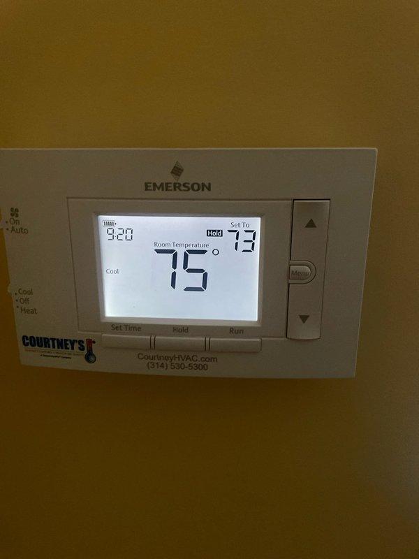 Completed comprehensive cooling system maintenance on an 18-year-old GE air conditioning unit. Performed standard AC tune-up procedures including inspection of all major components, cleaning of condenser coils, verification of refrigerant levels, and testing of electrical connections. Verified Emerson programmable thermostat operation, confirming proper communication between thermostat and cooling system with accurate temperature readings at 75°F and setpoint functionality. All systems tested and operating within normal parameters upon completion of preventive maintenance service.