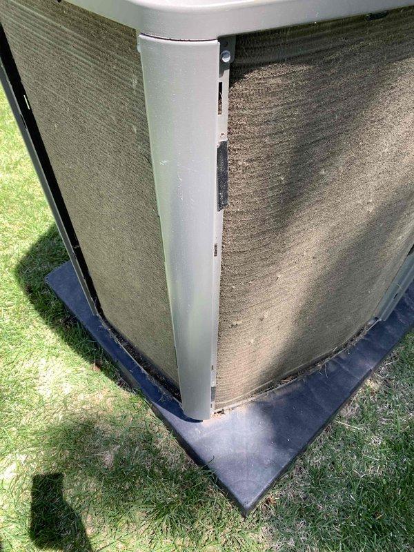 Completed comprehensive cooling system tune-up on 3-year-old outdoor AC unit. Performed standard maintenance protocol including inspection of condenser coils, which showed moderate accumulation of dirt and debris on exterior fins requiring cleaning attention. Unit operational and photographed for service records.