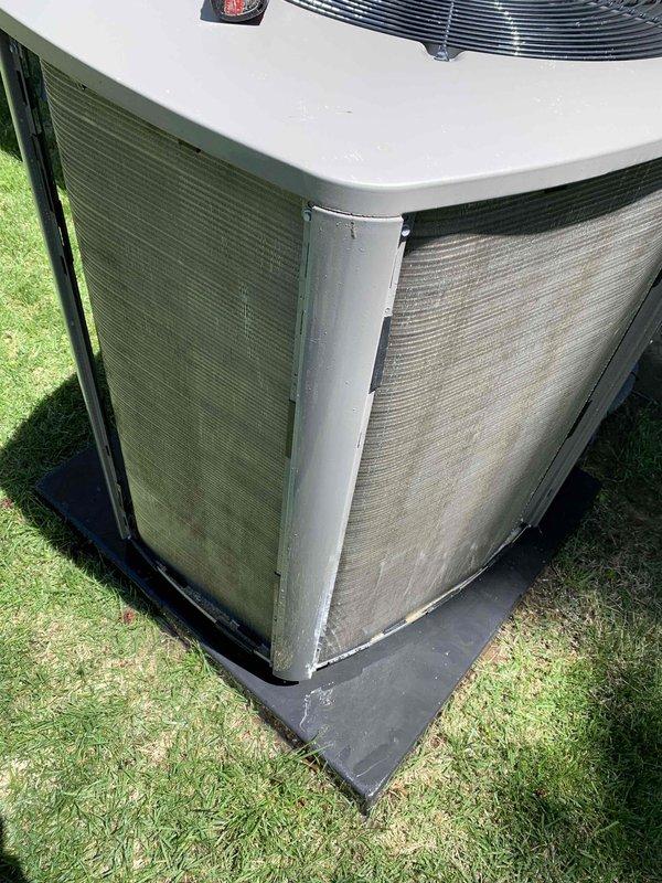 Completed comprehensive cooling system tune-up on 3-year-old outdoor AC unit. Performed standard maintenance protocol including inspection of condenser coils, which showed moderate accumulation of dirt and debris on exterior fins requiring cleaning attention. Unit operational and photographed for service records.