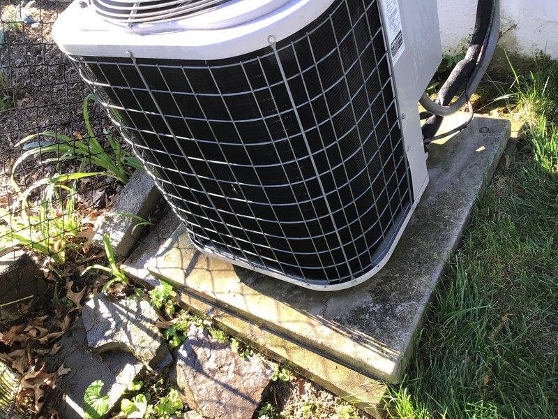 Completed first-time preventive maintenance cooling inspection on a 16-year-old air conditioning system. Performed comprehensive system evaluation including inspection of outdoor condenser unit, verification of proper airflow through protective grille, and assessment of unit mounting and levelness on concrete pad. Replaced air filter with new pleated media filter to ensure optimal airflow and system efficiency for the 2024 cooling season.