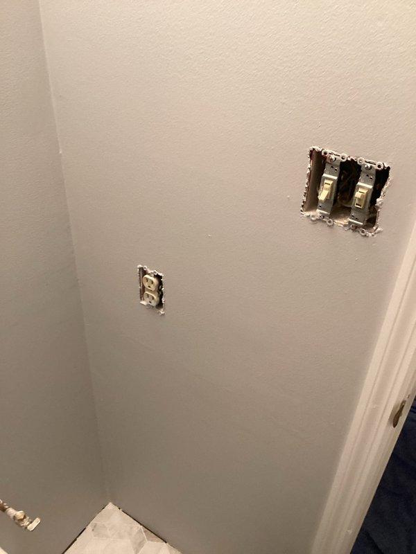 Completed electrical estimate for bathroom remodeling project involving relocation of existing outlet and installation of GFCI protection. Assessed current electrical configuration with exposed switch and outlet boxes, documented existing wiring conditions, and provided specifications for code-compliant GFCI outlet installation to meet bathroom safety requirements.