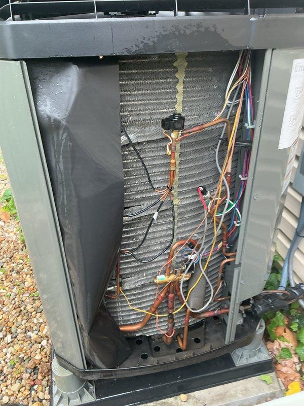 Completed preventive seasonal cooling checkup on two HVAC systems. Performed comprehensive inspection of indoor air handler unit in basement, including examination of furnace components, condensate drain system, and associated PVC drainage lines. Verified proper operation of condensate pan and drainage flow. Inspected outdoor condensing unit, noting accumulated debris and dirt on condenser coil fins. Assessed electrical connections, refrigerant lines, and copper line sets for proper installation and connection integrity. Documented equipment condition through photographs showing both indoor and outdoor components. All systems operational following maintenance inspection.