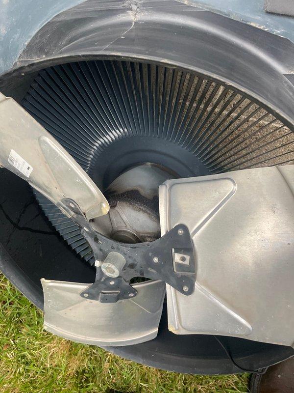 Replaced defective condenser fan motor (CFM) and fan blade assembly on outdoor heat pump unit. Retrieved motor from Trane and blade from Crescent parts supplier, completed installation, and verified proper operation of heating and cooling functions. Discarded failed components and confirmed unit operational upon completion.