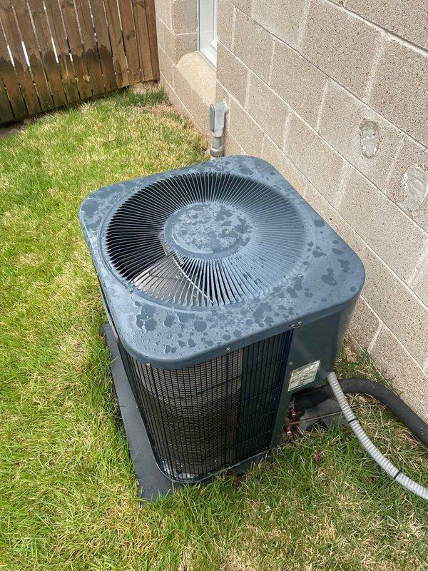 Replaced defective condenser fan motor (CFM) and fan blade assembly on outdoor heat pump unit. Retrieved motor from Trane and blade from Crescent parts supplier, completed installation, and verified proper operation of heating and cooling functions. Discarded failed components and confirmed unit operational upon completion.