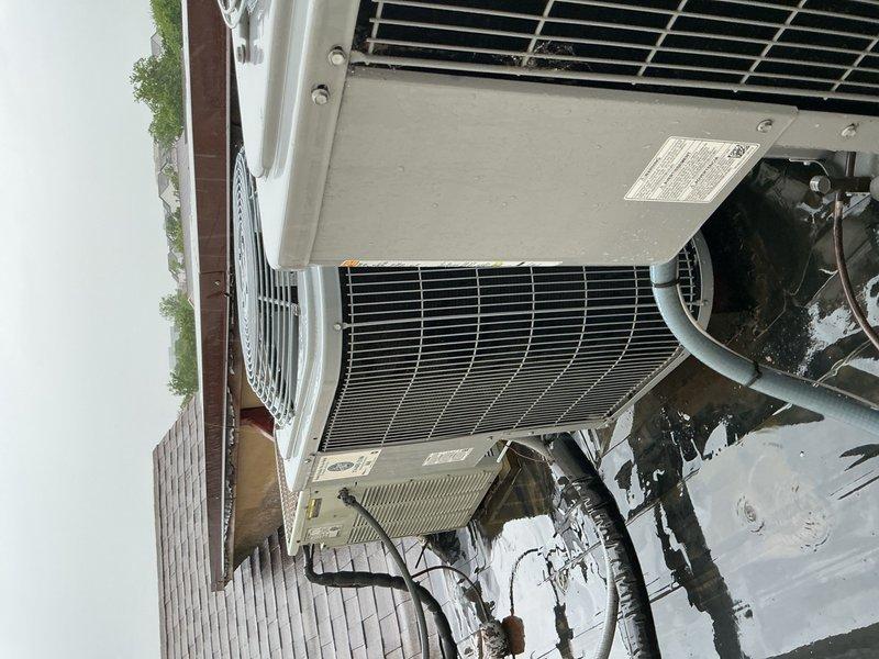 Completed comprehensive cooling system tune-up on 4-year-old rooftop AC unit accessed through attic. Performed standard preventive maintenance procedures including system inspection, cleaning of condenser coils, verification of refrigerant charge and electrical connections, and operational testing of all components. Unit found to be in good working condition with no deficiencies noted; system operating within manufacturer specifications upon completion.