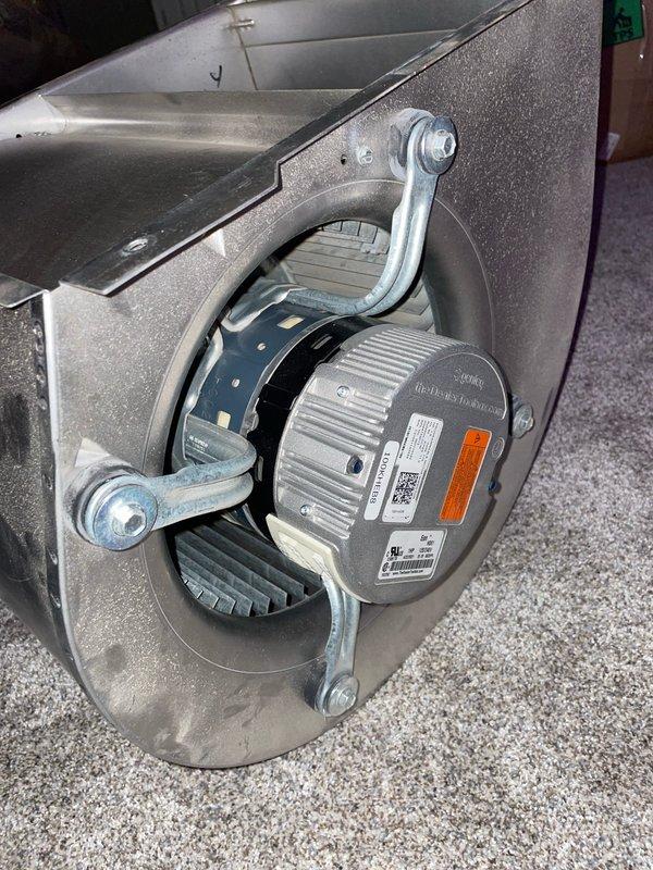 Replaced defective blower motor on HVAC unit serial number 21365pewgg. Installed new motor assembly with blower wheel, secured mounting brackets, and verified proper operation. Removed and disposed of failed original motor per warranty procedure.