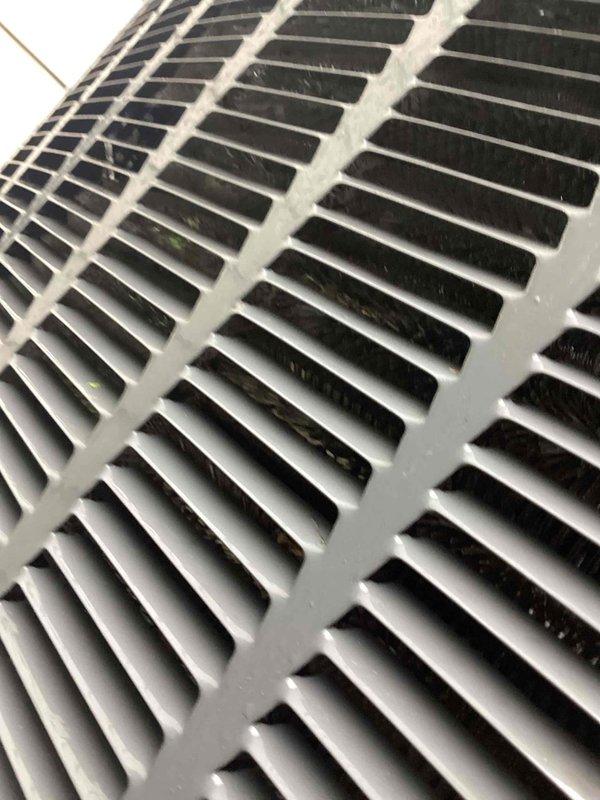 Responded to no cooling call on 4-year-old ground-level system displaying error codes 184.07 and 24.08 with complete unit failure. Upon arrival, found outdoor condenser coil heavily caked with dirt, dust, and debris causing significant airflow restriction and impaired heat exchange capability. Performed thorough coil cleaning to restore proper airflow and system operation. Inspected indoor air return grille and verified adequate airflow at air handler. Cleared fault codes, cycled system through complete operational test, and confirmed unit returned to normal cooling operation with proper temperature differential across coil.