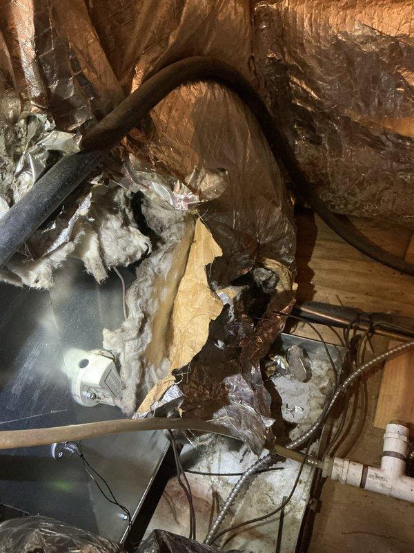 # HVAC Service - No Cool U10

Responded to no cooling complaint on one-month-old air conditioning system. Upon arrival, found system shut down due to drain pan full of water. Inspected condensate drain system in attic and identified clogged drain line preventing proper water evacuation. Cleared obstruction from condensate drain line and verified proper drainage flow. Tested system operation and confirmed unit cooling properly with condensate draining as designed. System returned to normal operation.