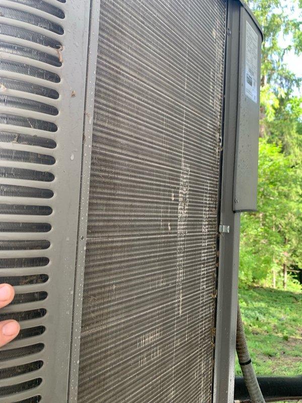 # HVAC Tune-Up Completed

Performed comprehensive preventative maintenance tune-up on a 2-year-old residential air conditioning system located at ground level. Conducted thorough inspection of outdoor condenser unit, noting moderate accumulation of dirt and debris on coil fins which was addressed during service. Inspected indoor air handler components and documented condition of air filter showing normal dust and debris buildup for the service interval. Completed all standard tune-up procedures including system performance evaluation, electrical connections check, refrigerant level assessment, and component cleaning as needed. Unit operational and functioning within normal parameters upon completion of service.