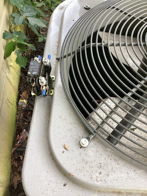 Responded to no cooling call on 9-year-old AC system. Diagnosed and replaced faulty blower motor resistor to restore proper fan operation. Upon inspection, identified corroded and heat-damaged wiring at the switch assembly, indicating electrical arcing or overheating condition that likely contributed to resistor failure. Documented equipment condition with photos of outdoor condenser unit and indoor air handler components for service records.