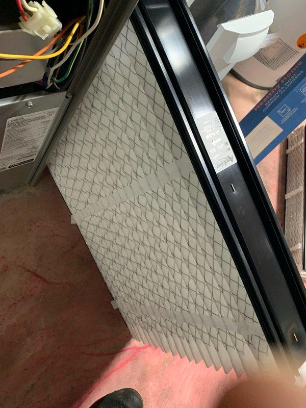 Completed comprehensive cooling tune-up on outdoor AC unit located on side of home. Performed standard maintenance protocol including inspection of blower motor assembly, electrical control boards, wiring connections, and verified proper 24VAC power supply to system components. Filter inspected and found in acceptable condition with proper airflow through diamond-pattern pleated media.