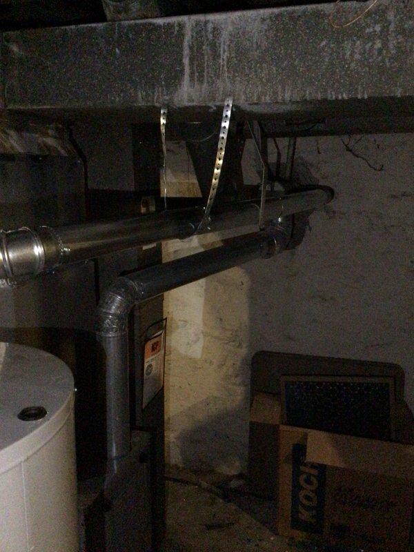 Removed and disposed of existing failed water heater from basement mechanical room. Installed new State ProLine 50-gallon tall residential water heater with proper connections to existing copper supply lines and discharge piping. Connected pressure relief valve with code-compliant discharge tube termination. Verified all water and gas connections for proper operation and tested unit for leaks. System operational and ready for service.