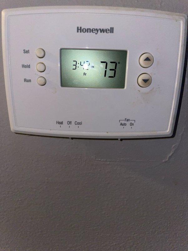 Responded to no-heat call on furnace system located in basement. Upon inspection, found blower assembly with significant dust accumulation on centrifugal fan blades and housing. Cleaned blower wheel thoroughly, verified proper motor operation, and confirmed Honeywell thermostat was functioning correctly and calling for heat at 73°. System restored to normal operation with adequate airflow and ignition sequence completing successfully.