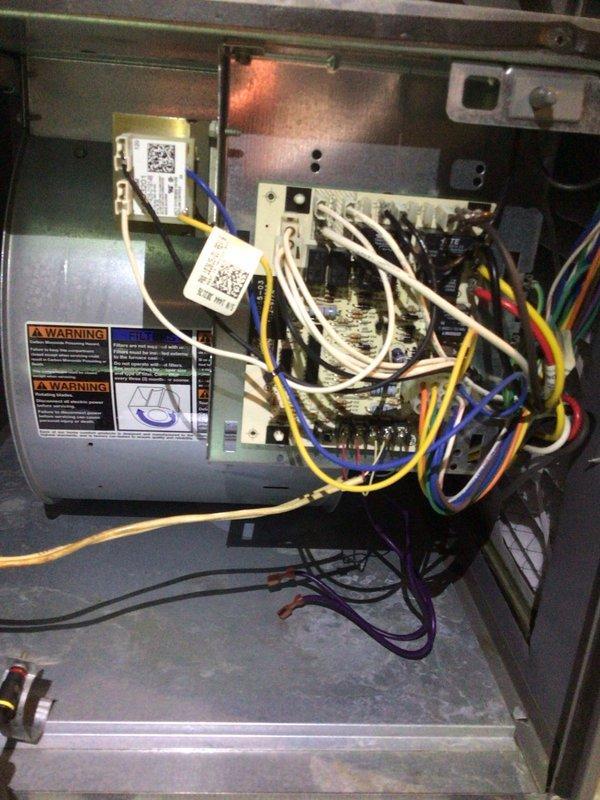 Completed comprehensive cooling maintenance and tune-up on residential AC system. Performed system diagnostics with digital multimeter confirming proper electrical readings at 7.4 volts, inspected and tested capacitor functionality, verified all electrical connections and wiring at terminal blocks, and examined blower motor assembly and control modules. All components found operating within normal parameters with system confirmed working properly upon completion.