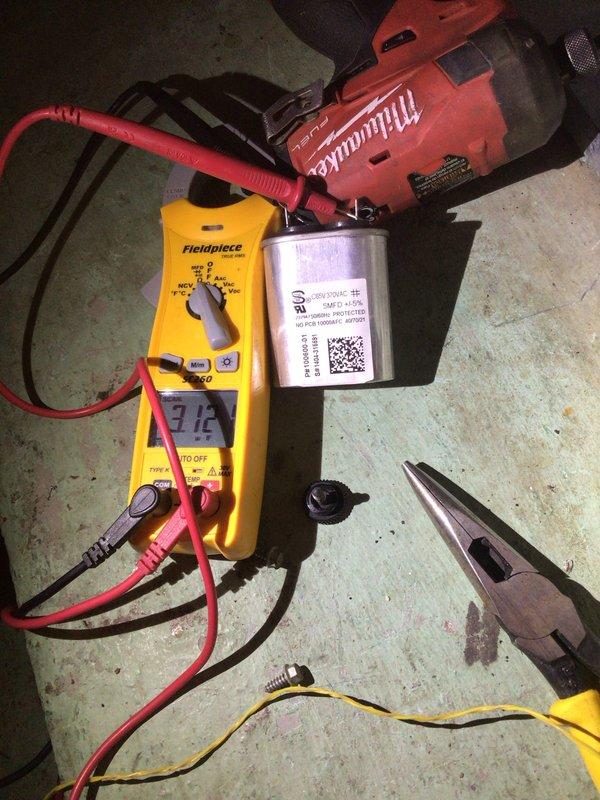Completed comprehensive cooling maintenance and tune-up on residential AC system. Performed system diagnostics with digital multimeter confirming proper electrical readings at 7.4 volts, inspected and tested capacitor functionality, verified all electrical connections and wiring at terminal blocks, and examined blower motor assembly and control modules. All components found operating within normal parameters with system confirmed working properly upon completion.