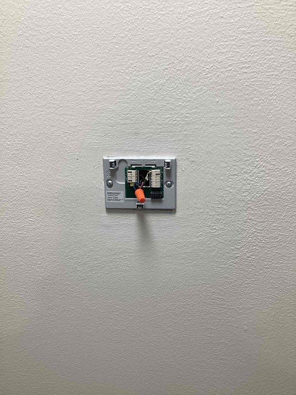Responded to no-cool call where AC unit would not start. Upon arrival, inspected thermostat wiring and found loose or improperly connected wire at terminal block, which was preventing proper signal communication to the outdoor unit. Verified furnace and indoor air handler were receiving power and checked electrical connections at equipment. Secured thermostat wiring connections, tested system operation, and confirmed unit cycled on properly with adequate cooling performance restored.