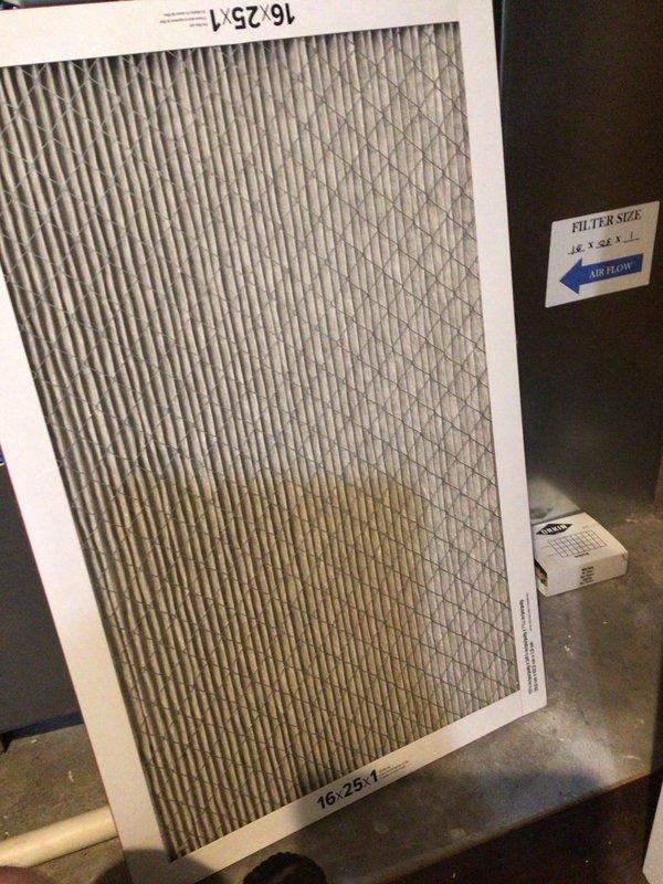 Completed seasonal cooling maintenance on 10-year-old residential air conditioning system located at side of house. Performed comprehensive tune-up including inspection of outdoor condensing unit, replaced dirty 16x25x1 air filter showing significant dust accumulation, verified proper airflow direction, and confirmed system operational status. Unit components inspected and found to be functioning within normal parameters for continued cooling season operation.