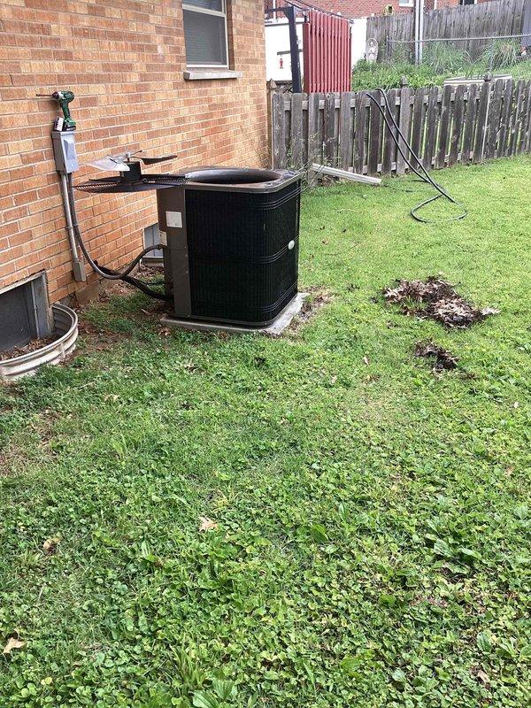 Responded to no cooling call on residential split system with outdoor condenser unit over 10 years old located on ground-level concrete pad at side of home. Upon arrival, found condenser not operating. Performed diagnostic inspection of outdoor unit, checked electrical connections, refrigerant lines, and compressor operation. Identified failure preventing unit from running and restored cooling operation. System tested and verified proper operation before departure.