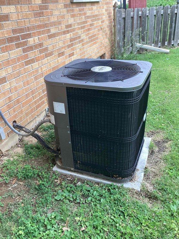 Responded to no cooling call on residential split system with outdoor condenser unit over 10 years old located on ground-level concrete pad at side of home. Upon arrival, found condenser not operating. Performed diagnostic inspection of outdoor unit, checked electrical connections, refrigerant lines, and compressor operation. Identified failure preventing unit from running and restored cooling operation. System tested and verified proper operation before departure.