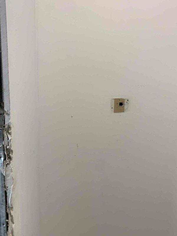 Completed electrical rewiring installation as per approved estimate. Ran new electrical wiring through interior walls to designated locations, requiring access points to be created in drywall. Installed and connected new thermostat wiring, properly terminating connections at thermostat location on interior wall. All wiring installed in compliance with electrical code requirements and tested for proper functionality upon completion.