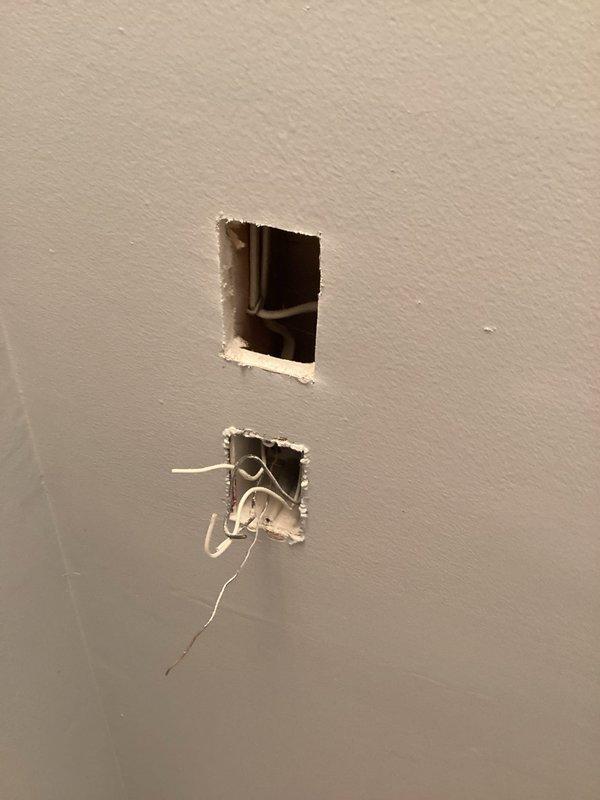 Relocated electrical outlet per approved estimate. Accessed existing electrical box through wall opening and verified circuit identification at main electrical panel. Ran new wiring from panel to relocated outlet position. Installed new electrical box at desired location and made proper connections. Verified circuit protection and tested outlet for proper operation upon completion.