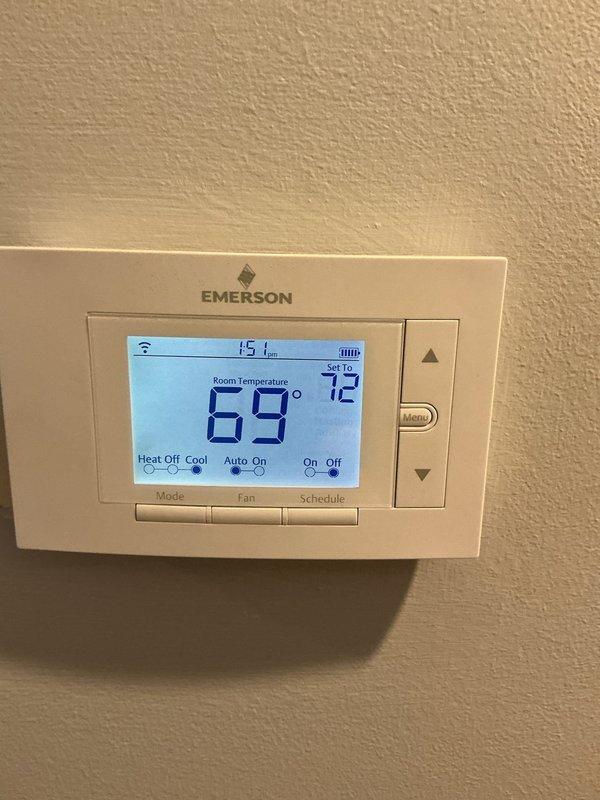# HVAC Service Completed

Responded to no cooling call for 10+ year old air conditioning system located in basement. Upon arrival, contacted customer per special instructions and proceeded with diagnostic evaluation.

Inspection revealed thermostat set to 72°F cooling mode while displaying actual room temperature of 69°F, indicating system was calling for cooling but not achieving desired temperature. Proceeded to indoor unit location in basement where visual inspection revealed extensive ice and frost buildup on evaporator coil assembly. Ice accumulation was severe, covering the coil fins and surrounding surfaces, with frost extending to copper refrigerant lines and fittings.

The frozen evaporator coil condition indicated restricted airflow or possible refrigerant system issues. This type of ice buildup prevents proper heat exchange and cooling capacity, explaining the no cool complaint. The crystalline frost pattern covered the coil surface and had accumulated on both the supply and