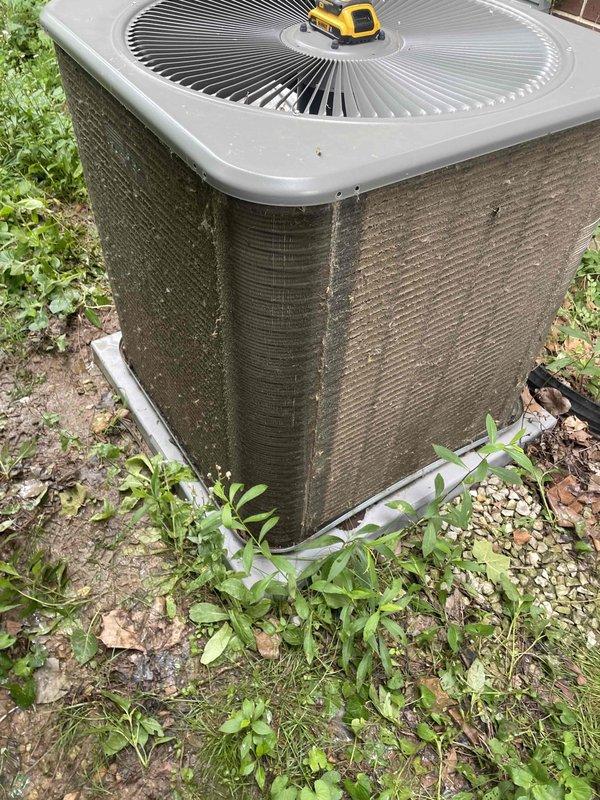 Completed comprehensive cooling tune-up maintenance on two HVAC units for new customer. Both units are approximately one year old, with one ground-mounted outdoor condenser and one basement-located unit. Performed standard U10 cooling system inspection protocol on both systems, including electrical component testing, capacitor evaluation, refrigerant pressure checks, and airflow assessment. Outdoor unit exhibited heavy dirt and debris accumulation on condenser coils and louvered panels, which was documented. All electrical connections, wiring, and mounted components were inspected and found to be properly secured and functional despite outdoor exposure conditions.