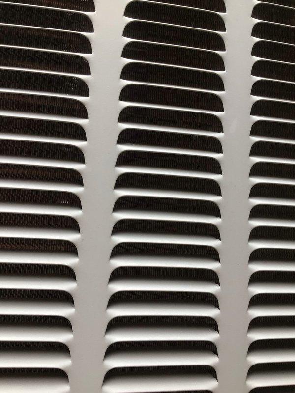 Performed comprehensive cooling maintenance tune-up on 9-year-old air conditioning system. Completed full system inspection including air handler components, ductwork integrity check, electrical connections, and ventilation grille assessment. All components found operating within normal parameters with proper airflow through return air grille and adequate duct configuration in confined utility space. System confirmed working efficiently with no issues identified requiring immediate attention.