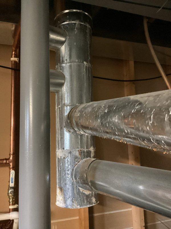 Completed comprehensive cooling tune-up and preventive maintenance on two residential air conditioning units located at the outdoor unit on the side of home and basement furnace/air handler system. Performed multi-point inspection including refrigerant level verification, electrical connection testing, condenser coil cleaning, air filter evaluation, condensate drain line inspection, and thermostat calibration on both units to ensure optimal system performance for the cooling season.