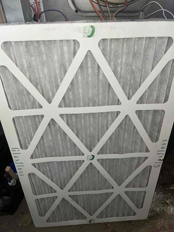 Completed preventive maintenance tune-up on two cooling systems at a residential property. Performed comprehensive inspection of both units including outdoor condenser units and indoor air handling equipment, checked refrigerant levels and pressures, inspected electrical connections and components, verified proper airflow through coils and ductwork, and evaluated filter condition. Documented existing 16x20x1 air filter showing moderate dust accumulation and exterior condenser unit with weathering consistent with outdoor exposure. Both systems operational and running within normal parameters upon completion of service.